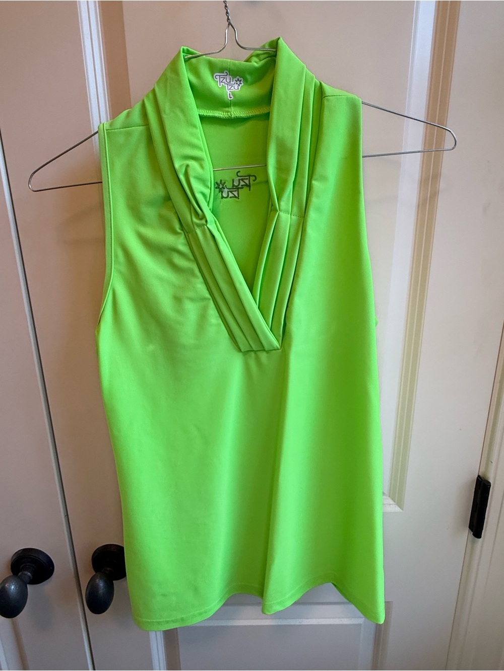 Neon green TzuTzu golf top size large